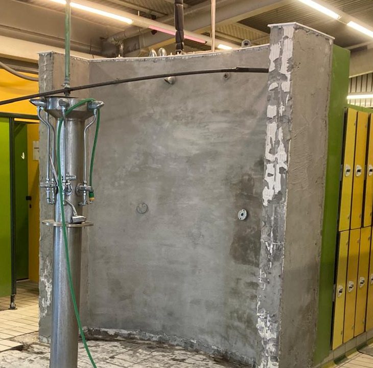Changing room shower, before