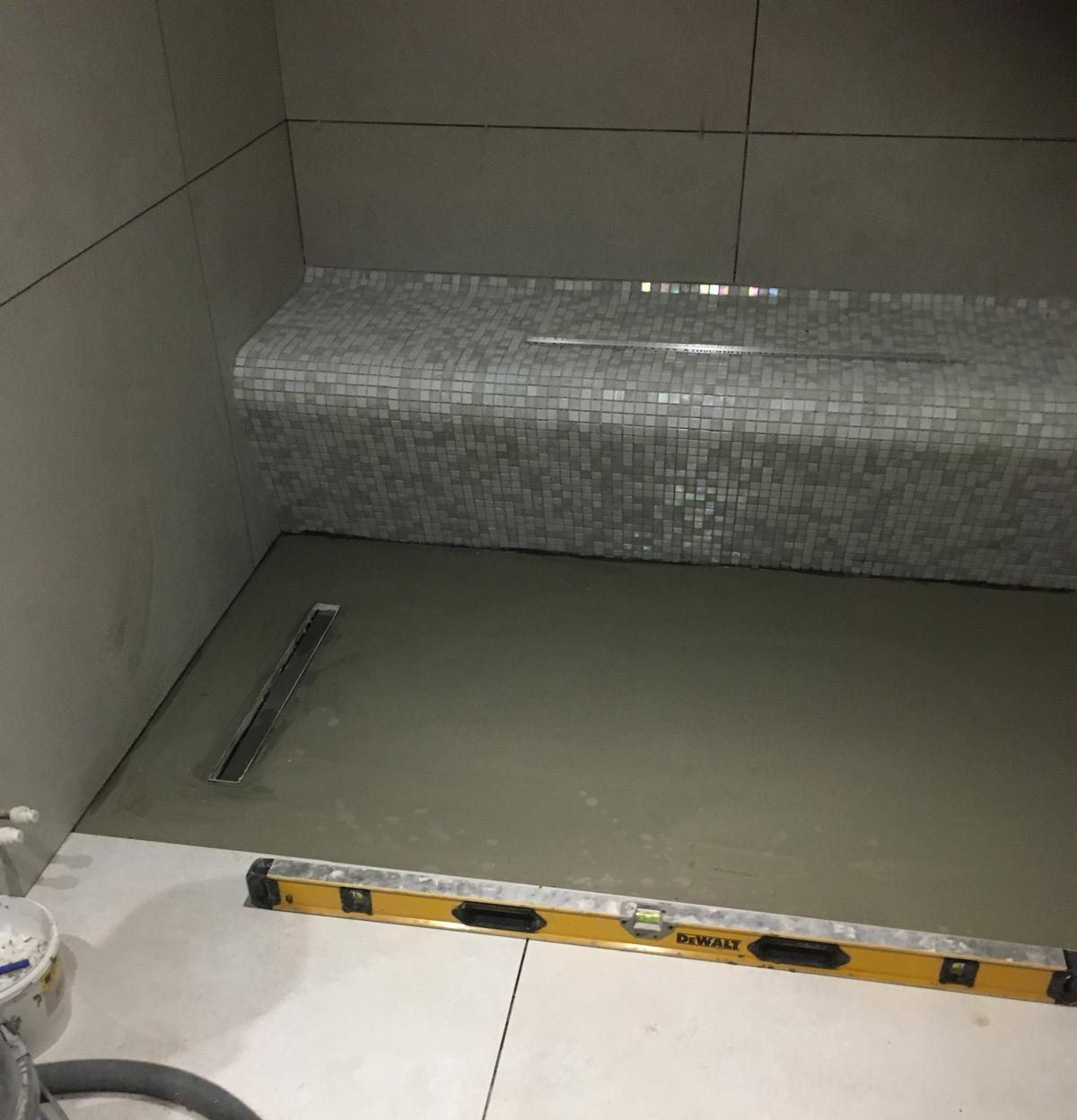 Walk-in shower floor, during