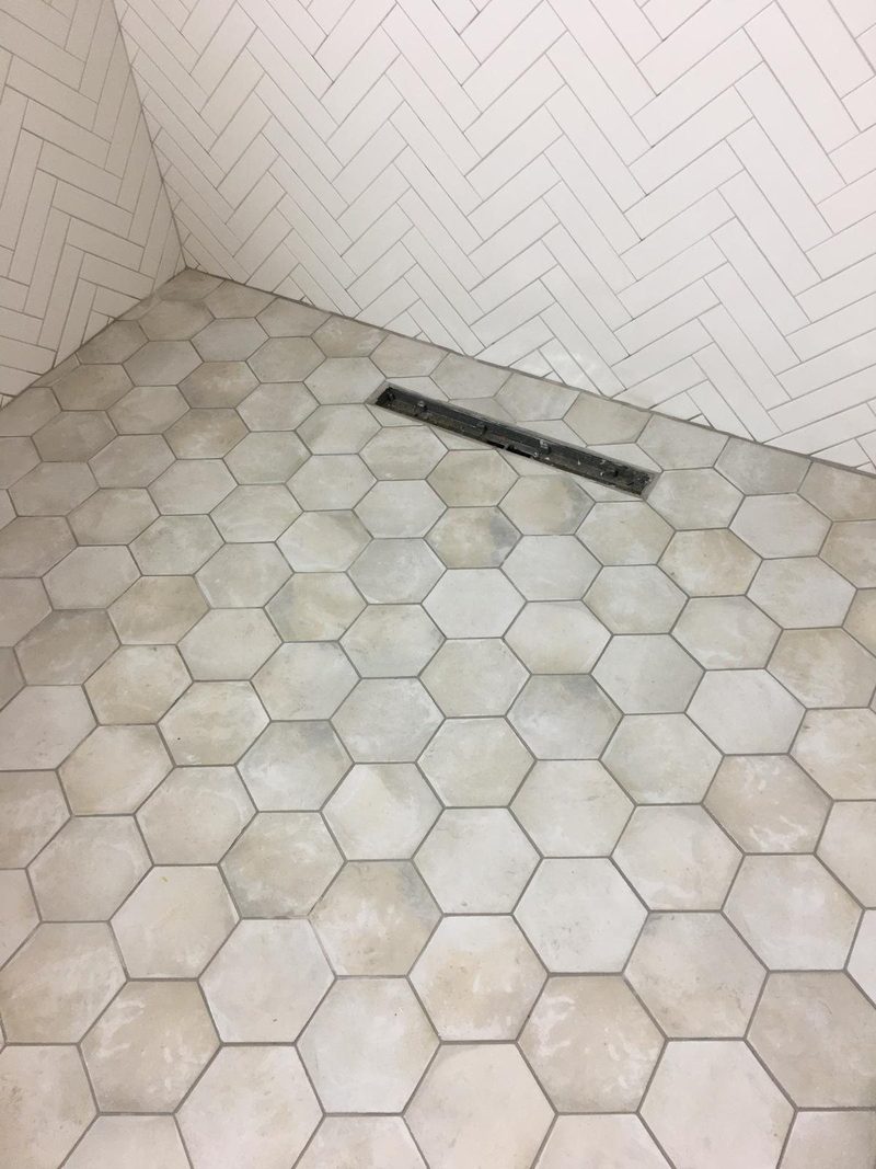 Hexagon floor with herringbone walls