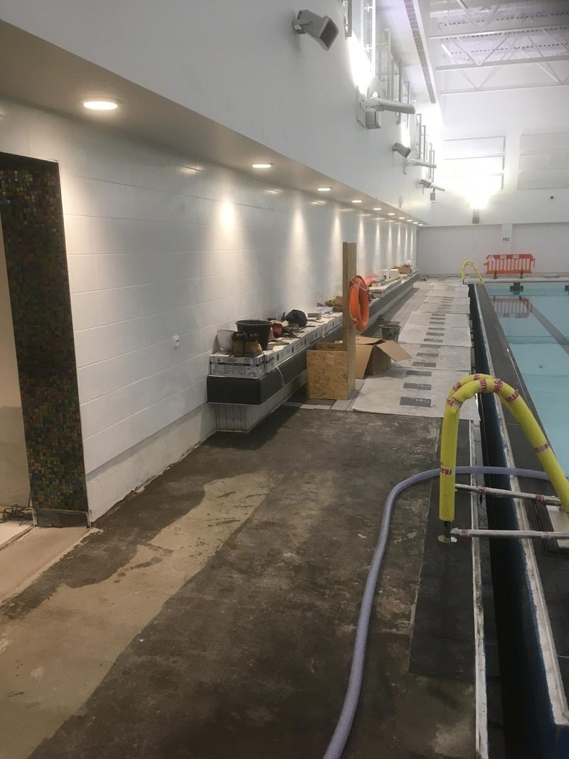 Pool surround with Greek key border steps