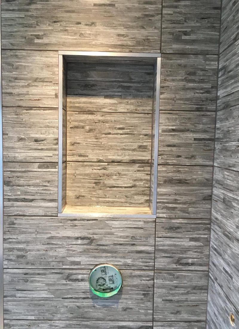 Stone-strip shower niche